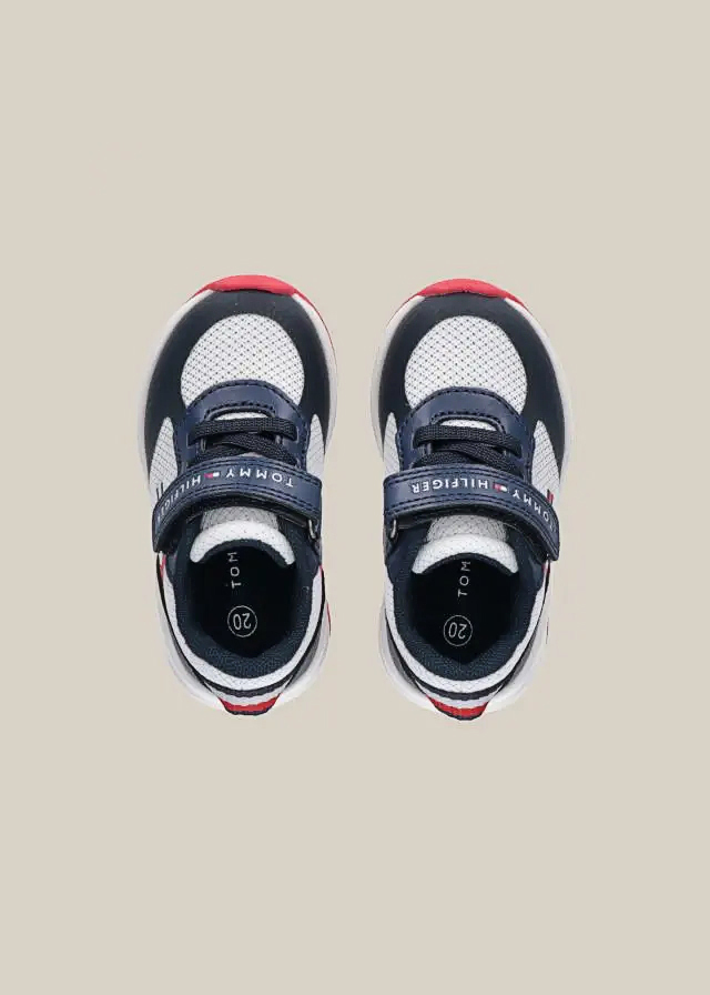 Кроссовки з білими та червоними вставками для мальчика темно-синие TOMMY-HILFIGER США
