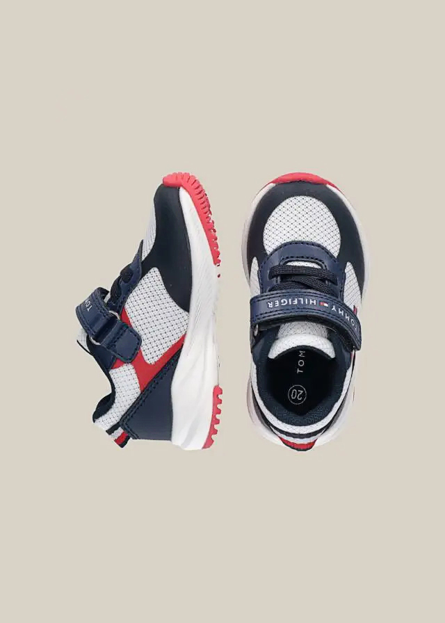 Кроссовки з білими та червоними вставками для мальчика темно-синие TOMMY-HILFIGER США
